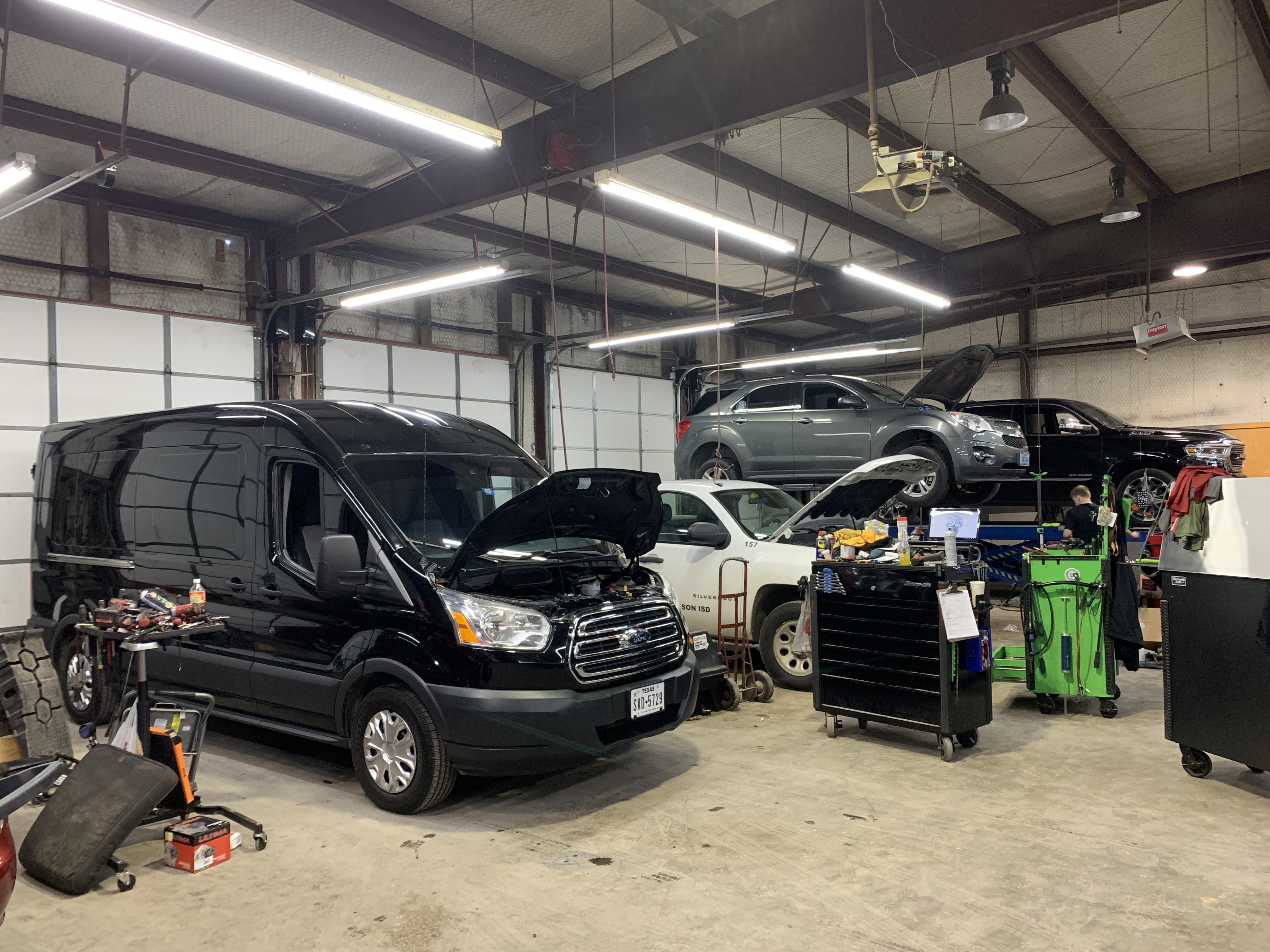 Multiple vehicles receiving maintenance service at Team Hoover Automotive